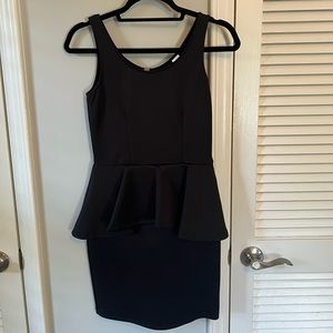 H&M Black Peplum dress. Size 8. Fits like a 4